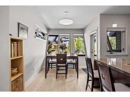 502-105 Stewart Creek Rise, Canmore, AB - Indoor Photo Showing Dining Room