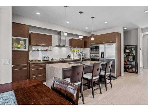 502-105 Stewart Creek Rise, Canmore, AB - Indoor Photo Showing Kitchen With Upgraded Kitchen