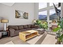 502-105 Stewart Creek Rise, Canmore, AB  - Indoor Photo Showing Living Room 