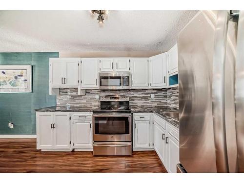 8-4769 Hubalta Road Se, Calgary, AB - Indoor Photo Showing Kitchen With Stainless Steel Kitchen With Upgraded Kitchen