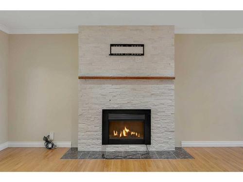 4704 Whitehorn Drive Ne, Calgary, AB - Indoor Photo Showing Living Room With Fireplace