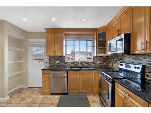 4704 Whitehorn Drive Ne, Calgary, AB - Indoor Photo Showing Kitchen With Stainless Steel Kitchen With Double Sink