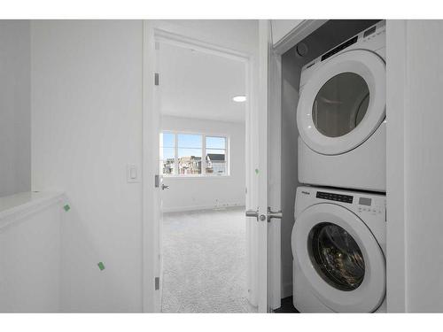 20146 45 Street Se, Calgary, AB - Indoor Photo Showing Laundry Room