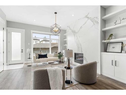 1428 27 Street Sw, Calgary, AB - Indoor Photo Showing Living Room With Fireplace