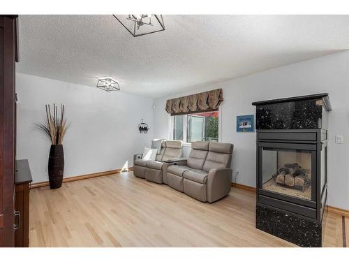 472 Sierra Morena Place Sw, Calgary, AB - Indoor Photo Showing Living Room With Fireplace