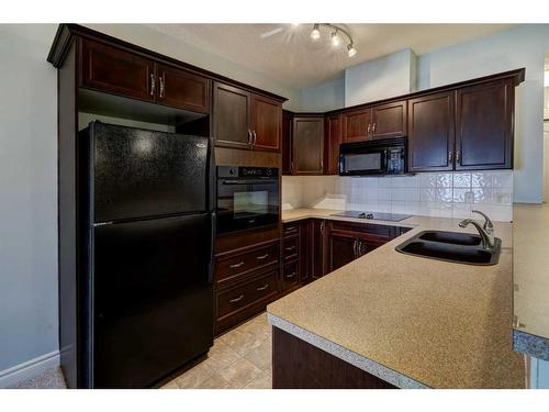 335-60 Royal Oak Plaza Nw, Calgary, AB - Indoor Photo Showing Kitchen With Double Sink