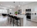 232 Chelsea Manor, Chestermere, AB  - Indoor Photo Showing Kitchen With Stainless Steel Kitchen With Upgraded Kitchen 