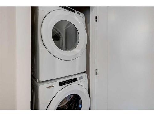 232 Chelsea Manor, Chestermere, AB - Indoor Photo Showing Laundry Room