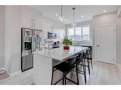 232 Chelsea Manor, Chestermere, AB - Indoor Photo Showing Kitchen With Upgraded Kitchen