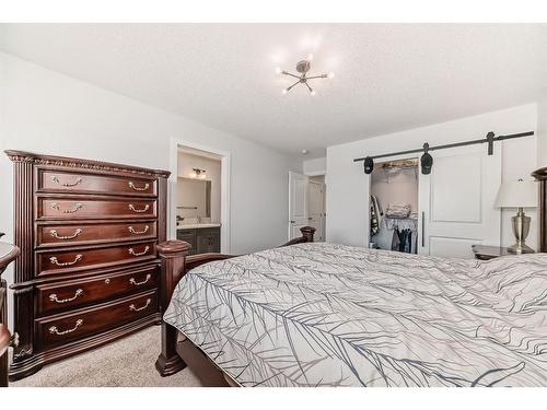 25 Silverton Glen Way Sw, Calgary, AB - Indoor Photo Showing Bedroom