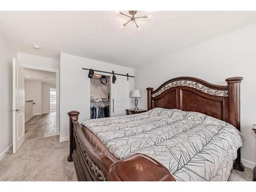 25 Silverton Glen Way Sw, Calgary, AB - Indoor Photo Showing Bedroom