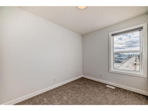 25 Silverton Glen Way Sw, Calgary, AB - Indoor Photo Showing Other Room