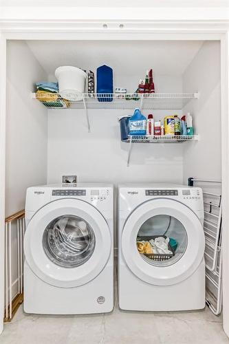 25 Silverton Glen Way Sw, Calgary, AB - Indoor Photo Showing Laundry Room