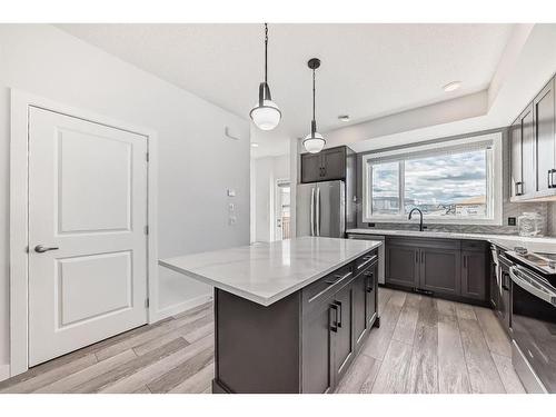 25 Silverton Glen Way Sw, Calgary, AB - Indoor Photo Showing Kitchen With Stainless Steel Kitchen With Upgraded Kitchen