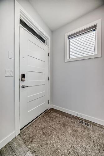 25 Silverton Glen Way Sw, Calgary, AB - Indoor Photo Showing Other Room