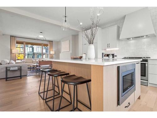 43 Bluerock Avenue Sw, Calgary, AB - Indoor Photo Showing Kitchen With Upgraded Kitchen