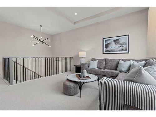 43 Bluerock Avenue Sw, Calgary, AB - Indoor Photo Showing Living Room