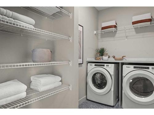 43 Bluerock Avenue Sw, Calgary, AB - Indoor Photo Showing Laundry Room