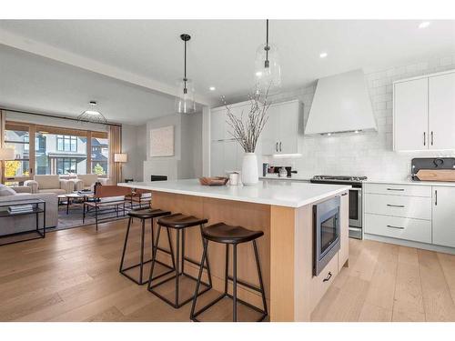 43 Bluerock Avenue Sw, Calgary, AB - Indoor Photo Showing Kitchen With Upgraded Kitchen