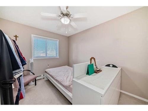 413-5000 Somervale Court Sw, Calgary, AB - Indoor Photo Showing Bedroom