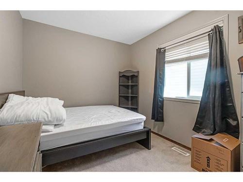 7 Pantego Rise Nw, Calgary, AB - Indoor Photo Showing Bedroom