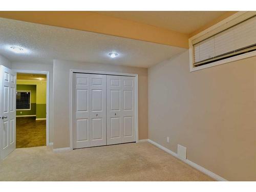 7 Pantego Rise Nw, Calgary, AB - Indoor Photo Showing Bedroom