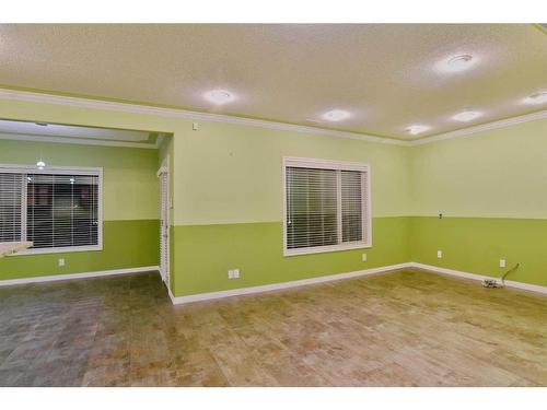 7 Pantego Rise Nw, Calgary, AB - Indoor Photo Showing Bedroom