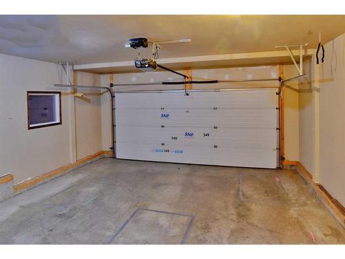 7 Pantego Rise Nw, Calgary, AB - Indoor Photo Showing Garage