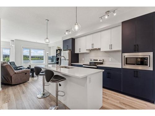 602-238 Sage Valley Common Nw, Calgary, AB - Indoor Photo Showing Kitchen With Stainless Steel Kitchen With Upgraded Kitchen