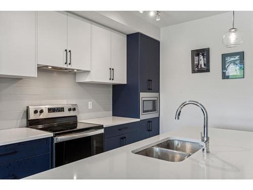 602-238 Sage Valley Common Nw, Calgary, AB - Indoor Photo Showing Kitchen With Stainless Steel Kitchen With Double Sink With Upgraded Kitchen