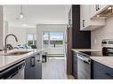 602-238 Sage Valley Common Nw, Calgary, AB  - Indoor Photo Showing Kitchen With Double Sink With Upgraded Kitchen 