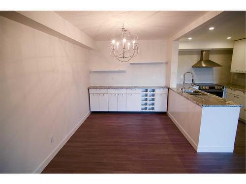 406-225 25 Avenue Sw, Calgary, AB - Indoor Photo Showing Kitchen With Double Sink