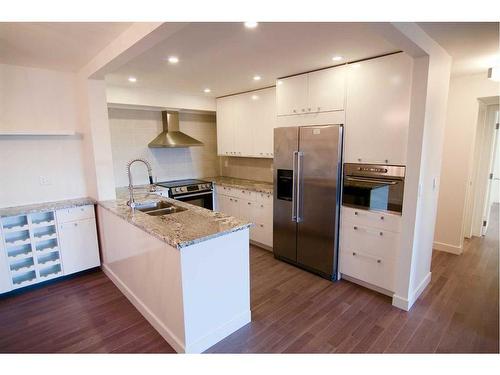 406-225 25 Avenue Sw, Calgary, AB - Indoor Photo Showing Kitchen With Double Sink With Upgraded Kitchen