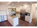 406-225 25 Avenue Sw, Calgary, AB  - Indoor Photo Showing Kitchen With Double Sink With Upgraded Kitchen 