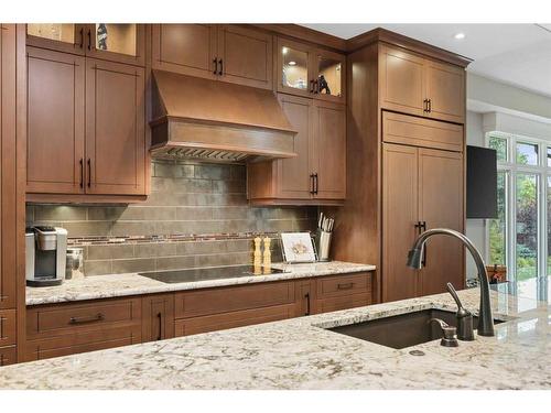 128 Lake Mead Green Se, Calgary, AB - Indoor Photo Showing Kitchen With Double Sink