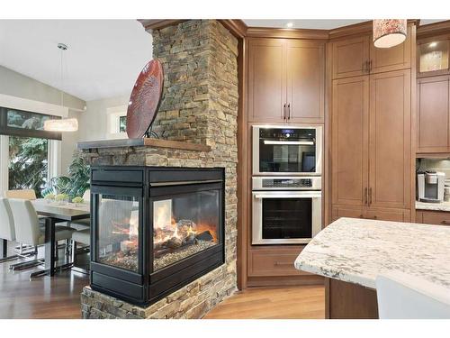 128 Lake Mead Green Se, Calgary, AB - Indoor With Fireplace