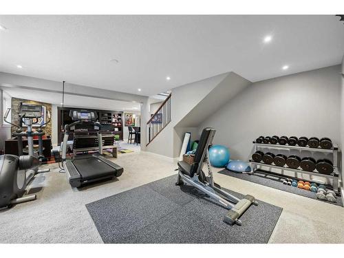 128 Lake Mead Green Se, Calgary, AB - Indoor Photo Showing Gym Room