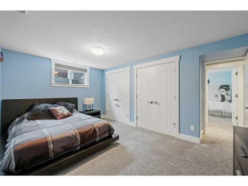 128 Lake Mead Green Se, Calgary, AB - Indoor Photo Showing Bedroom