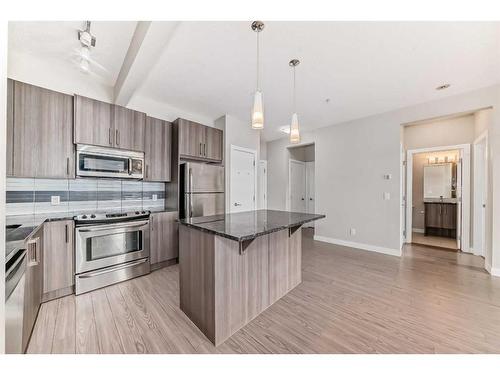 208-8 Sage Hill Terrace Nw, Calgary, AB - Indoor Photo Showing Kitchen With Stainless Steel Kitchen With Upgraded Kitchen