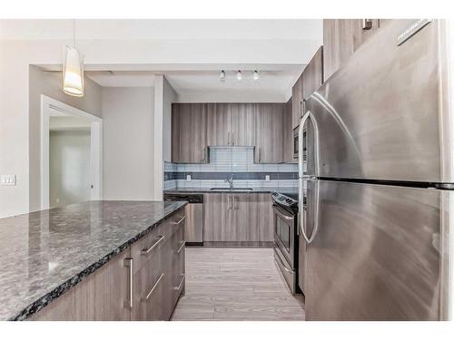 208-8 Sage Hill Terrace Nw, Calgary, AB - Indoor Photo Showing Kitchen With Stainless Steel Kitchen With Upgraded Kitchen