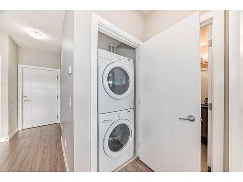 208-8 Sage Hill Terrace Nw, Calgary, AB - Indoor Photo Showing Laundry Room