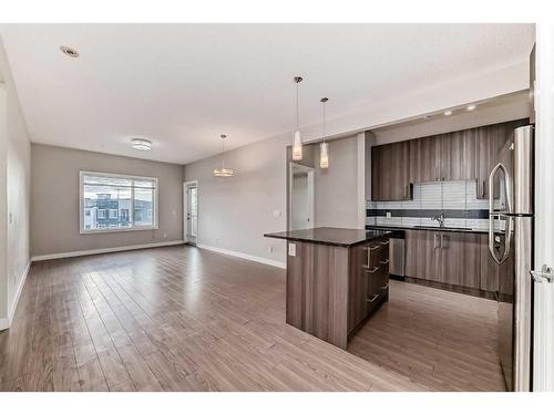 208-8 Sage Hill Terrace Nw, Calgary, AB - Indoor Photo Showing Kitchen With Upgraded Kitchen