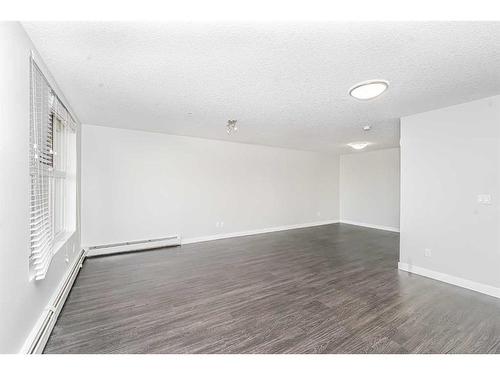 2308-95 Burma Star Road Sw, Calgary, AB - Indoor Photo Showing Other Room