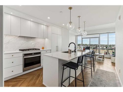 407-8445 Broadcast Avenue Sw, Calgary, AB - Indoor Photo Showing Kitchen With Upgraded Kitchen