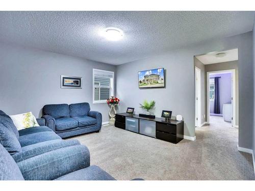 100 Redstone Parade Ne, Calgary, AB - Indoor Photo Showing Living Room