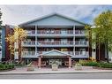 104-525 56 Avenue Sw, Calgary, AB  - Outdoor With Facade 