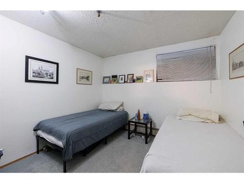 104-525 56 Avenue Sw, Calgary, AB - Indoor Photo Showing Bedroom