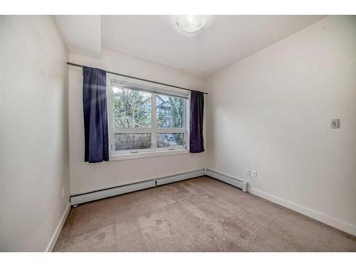 112-15233 1 Street Se, Calgary, AB - Indoor Photo Showing Other Room