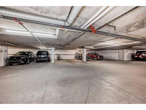 112-15233 1 Street Se, Calgary, AB - Indoor Photo Showing Garage