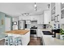 172 Somerside Close Sw, Calgary, AB  - Indoor Photo Showing Kitchen With Double Sink With Upgraded Kitchen 